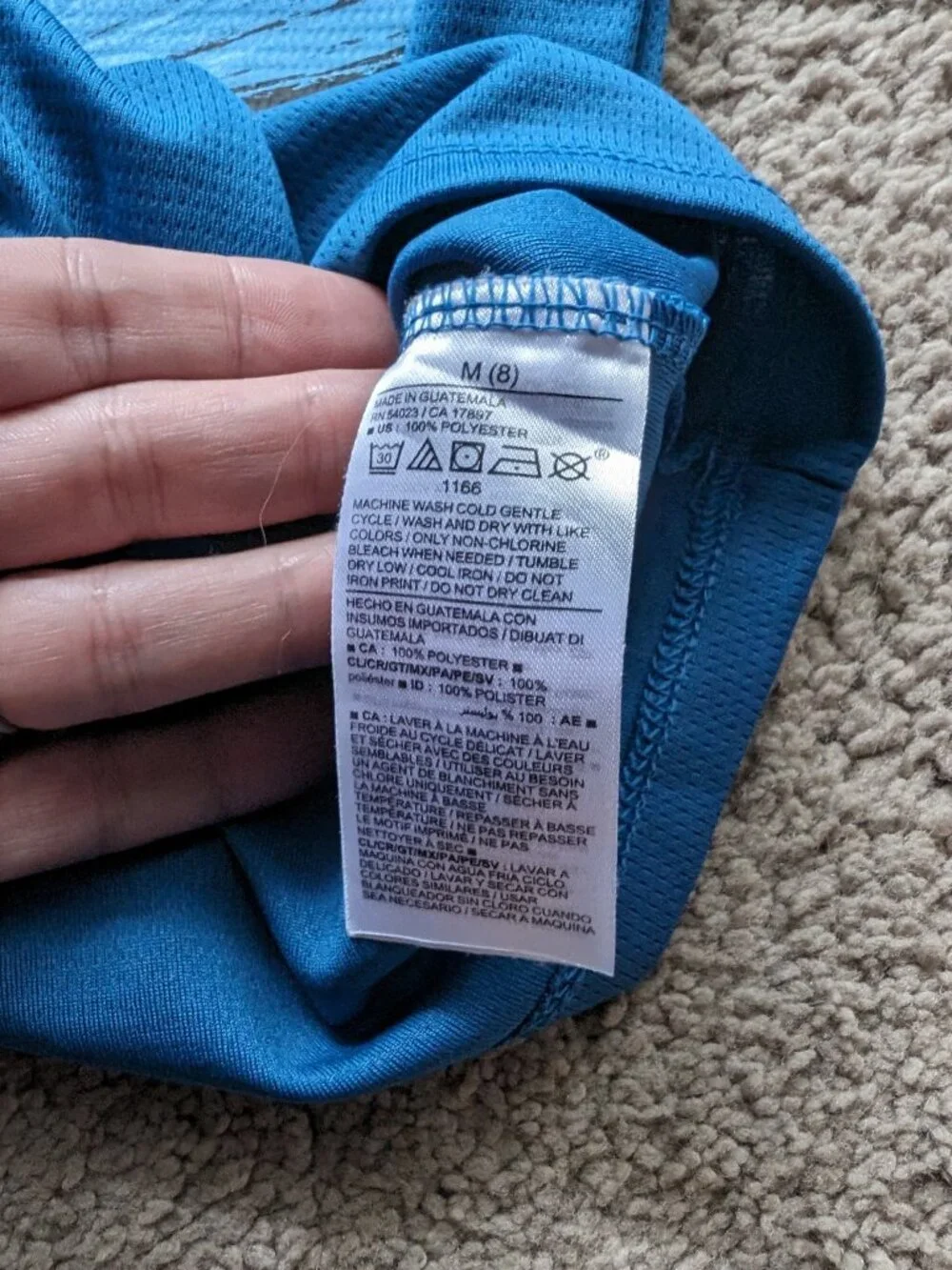 ON blue rashguard/swim top (YM)